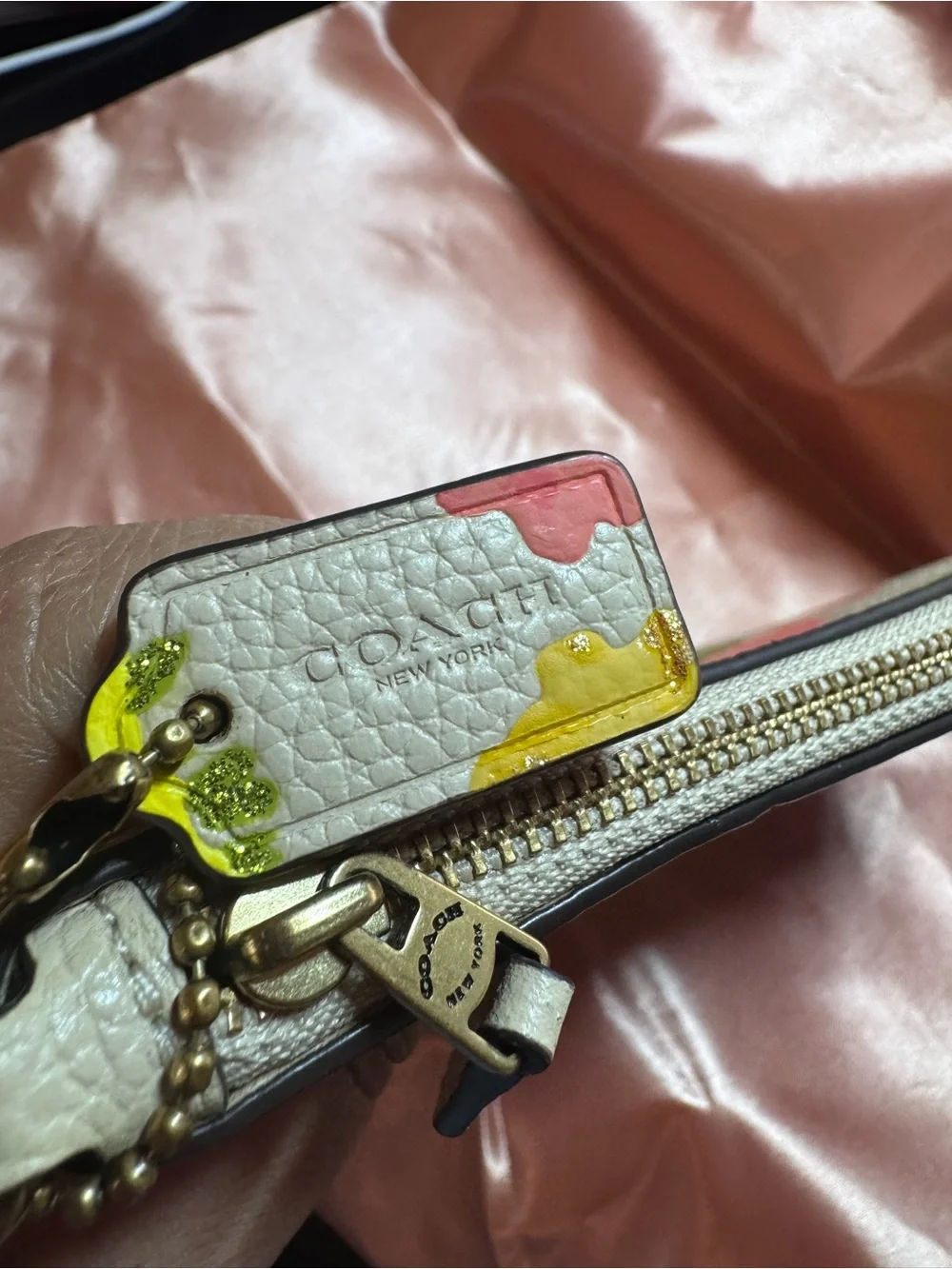 COACH Floral Pebbled Leather Wristlet in White with Pink, Yellow & Green